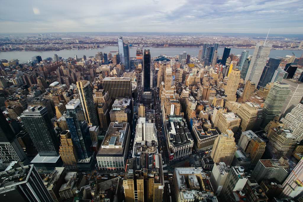 An expansive city skyline overlooking the river